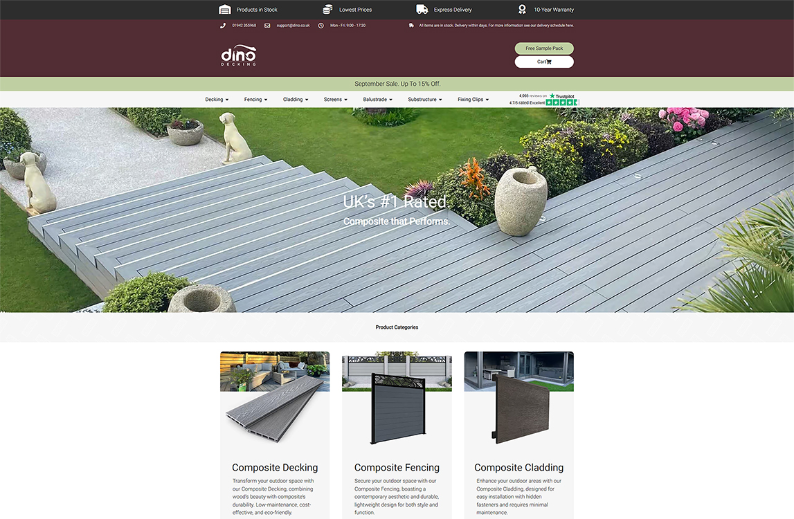 Composite decking and outdoor products displayed on Dino Decking's website, showcasing a modern outdoor space with grey composite boards, decorative planters, and a well-maintained garden. Features promotional banner for September sale and product categories including decking, fencing, and cladding.